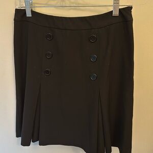 INC black skirt with button detail front, pleats and side zip EUC